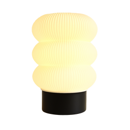 Lámpara KLÉIA de mesa apagada, diseño escultórico impreso en 3D, color blanco marfil con base negra, estilo contemporáneo